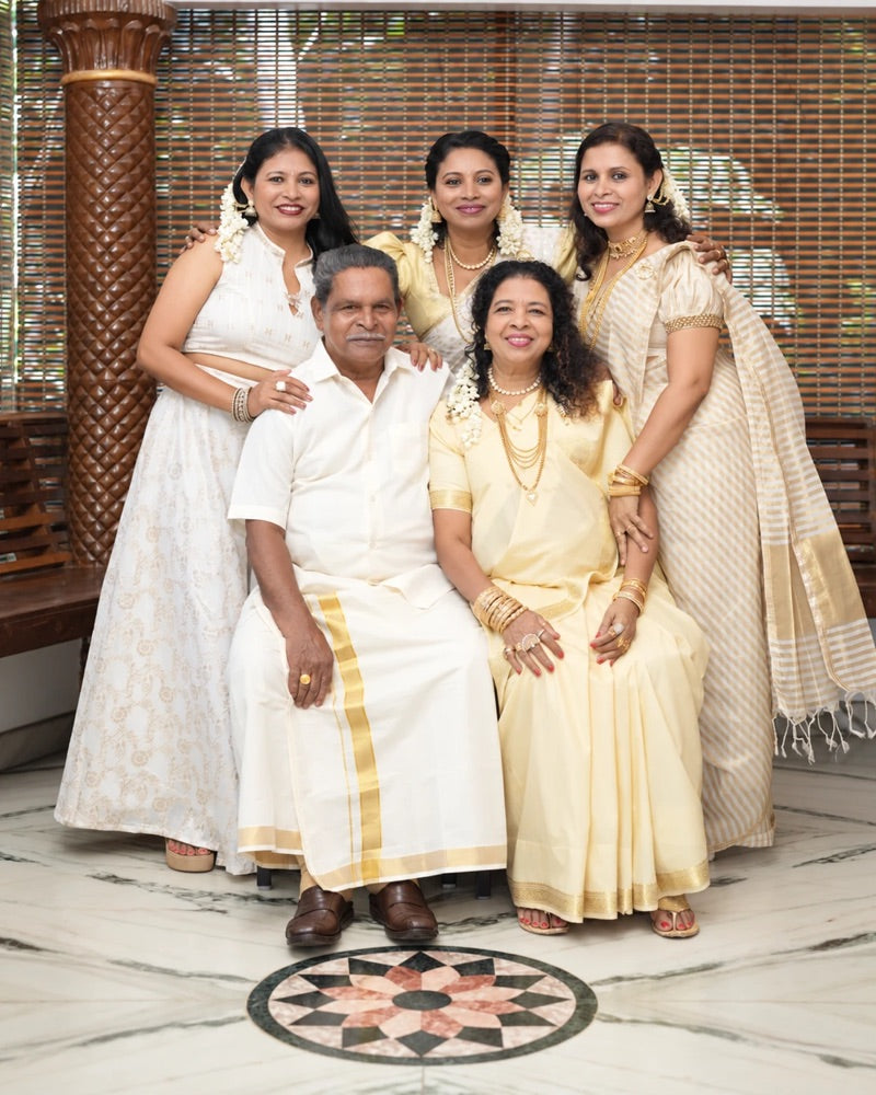 Rejani, Rejitha and Sonia with their parents at home in Keralam